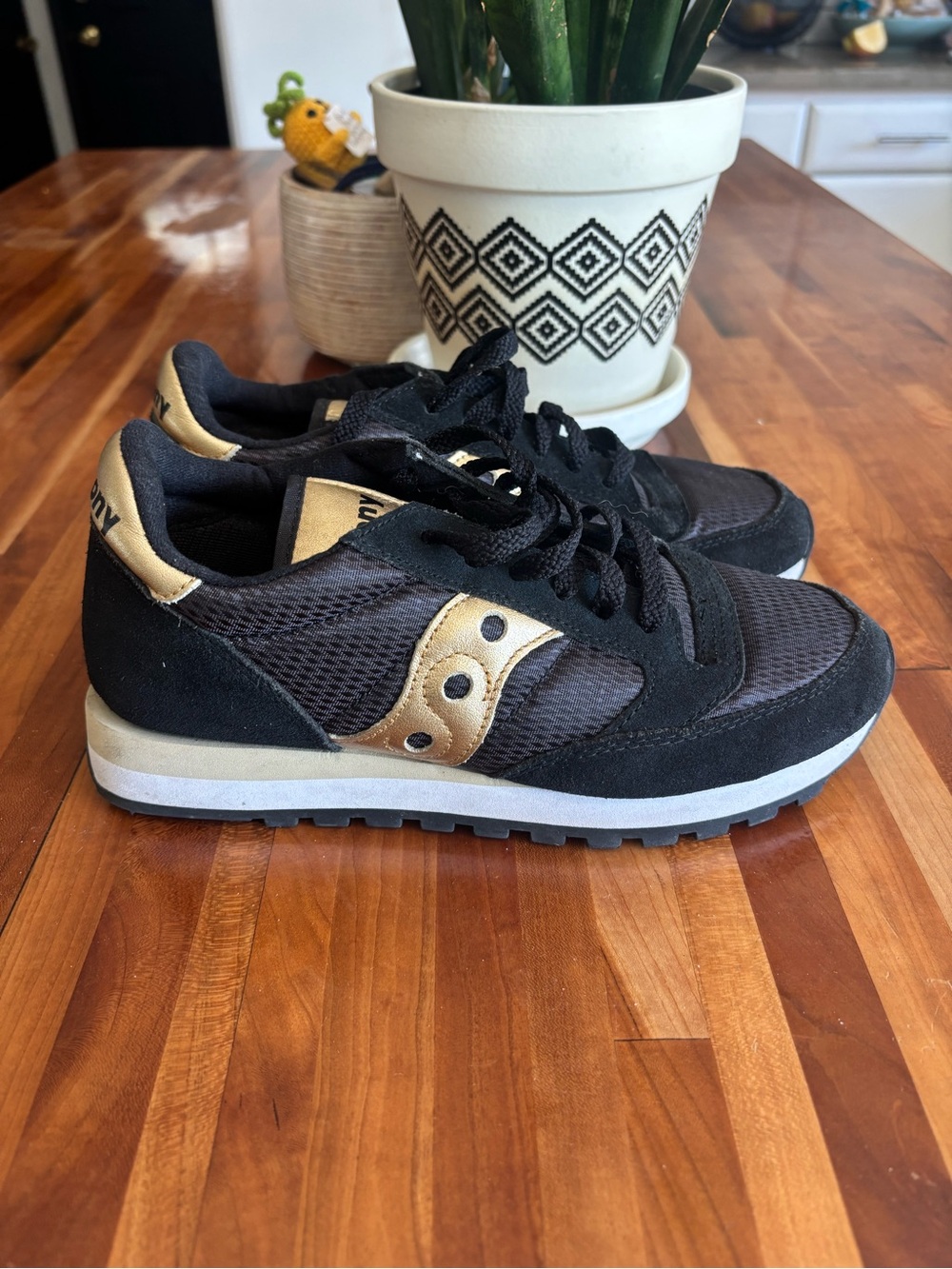 Saucony Women’s Black and Gold Retro-Style Sneakers